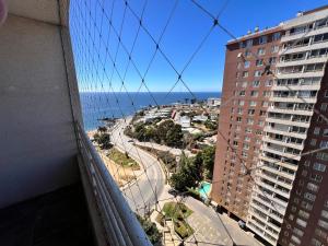a view of the ocean from a building at Mar & Costa Valparaíso in Valparaíso