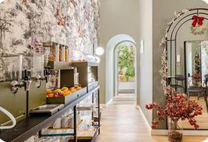 a kitchen with a counter with fruits on it at xenia apartments & suite in Syracuse