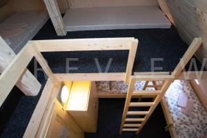 an overhead view of a bedroom with a bunk bed at Ťatliakova chata in Zuberec