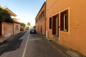 a car parked on a street next to a building at Smeraldo in Palau