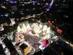 an aerial view of a crowd at a concert at night at Hotel Parinay Vatika in Deoghar +32 photos