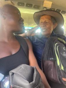 a man and a woman sitting in a car at BriBri AdvenTOURS in Tapantí