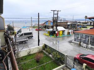 a view of a street in a small town at Seawaves in Ierissos
