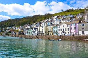 a town on a hill with boats in the water at 3 Bed in Dartmouth oc-bc21 in Dartmouth