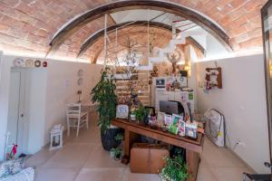 a room with a desk with a computer in it at Il Nido Di Anna in San Gimignano