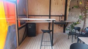 a bar with a stool and a table in a room at Azat - Toon in Garni +26 photos