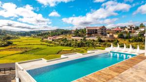an image of a swimming pool in a villa at Ricefield Valley in Mandrangobato