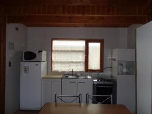 Una cocina o zona de cocina en Cabañas del Español