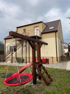 a play set in front of a house at Aurum Vendégház in Esztergom