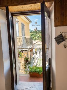 an open door to a balcony with a view at La Chiave del Gufo - Bojano in Boiano