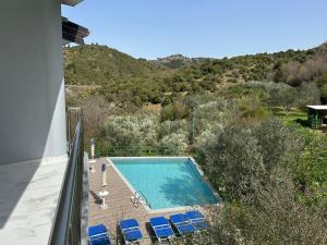 a view of a swimming pool from a house at Qyteza guest house in Shkodër
