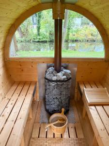 an inside view of a sauna with benches and a window at Ferienwohnungen Ast in Burg