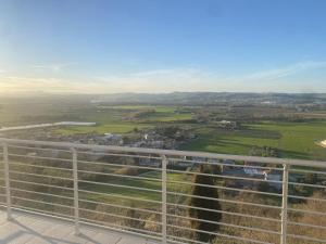 a view of the countryside from the balcony of a house at Dimora Filippo in SantʼElpidio a Mare
