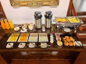 a buffet with many different types of food on a table at Andina Amazon Lodge in Chachapoyas +15 photos