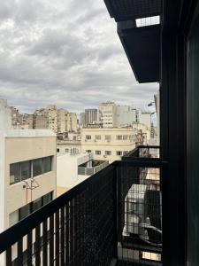 a view of a city from a balcony at Apart Hotel CABA in Buenos Aires
