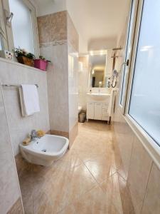 a bathroom with a sink and a shower at La Piazza B&B in Vercurago