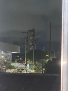 a view of a city at night with buildings at Paradise in Natal