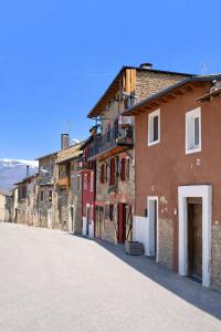 a group of buildings on a street at Casa en Vilallobent Cerdanya ideal familias by CalQuerol in Vilallovent