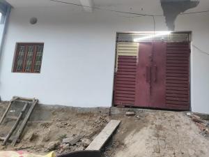 a building with a purple door in the side of it at The Four Season Pranav Resort - A Lavish Luxury Property in Nainital