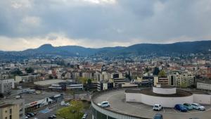 a view of a city with buildings and cars at Le Cocon Clermontois - T2 Centre in Clermont-Ferrand