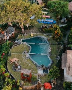 a model of a swimming pool in a garden at Aranka Tempasan in Sangyang