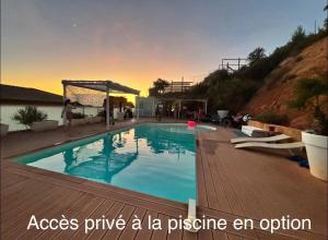 a large swimming pool with at Love Room L Interlude in Vitrolles