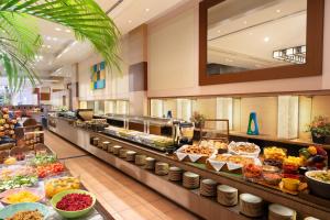a buffet line with many different types of food at Southern Beach Hotel & Resort Okinawa in Itoman