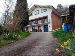 a house on the side of a road at Villa des écureuils in Dole