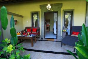 Posezení v ubytování Taruna Boutique Homestay & Spa