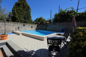 Bazén v ubytování Ambrosio Relais nebo v jeho okolí