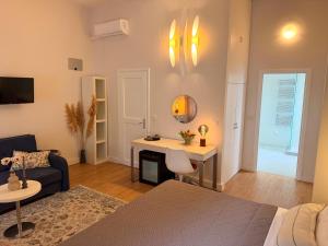 a living room with a couch and a table at La Villa Lopud- Breakfast & Dinner Included in Lopud