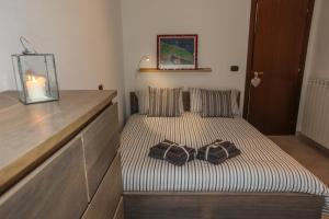 Postel nebo postele na pokoji v ubytování Casa vacanze Letto & Latte