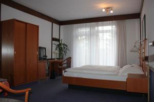 เตียงในห้องที่ Hotel Zum Ratsherrn