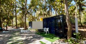 a modern house in the middle of a forest at The Wildcamp - Coorg in Kushālnagar +39 photos