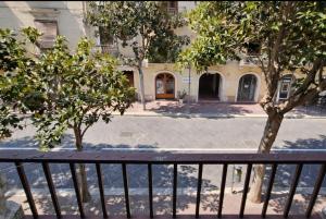 a view of a building from a balcony at Corso Vittorio Elegant Suites Lipari in Lipari