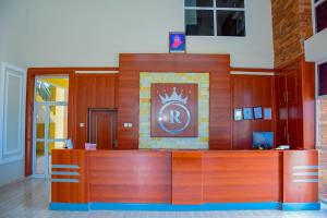 an office with a reception desk in a building at The Residence Hotel Dodoma in Dodoma +74 photos
