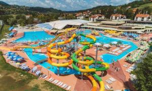 a large water park with a water slide at Art house Tufi in Bistrica ob Sotli