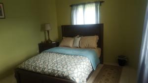 Säng eller sängar i ett rum på Valley View Property