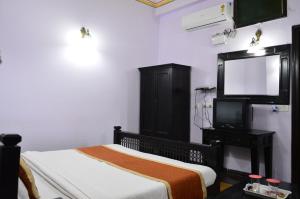 TV a/nebo společenská místnost v ubytování Hotel Amer View