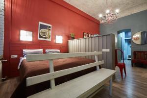 Mogol Apartments tesisinde bir odada yatak veya yataklar