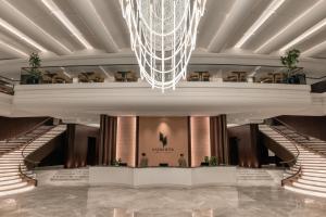 a rendering of the lobby of the shangri la hotel singapore at Kazakhstan Express in Almaty