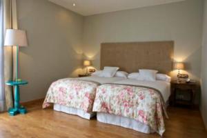 Postel nebo postele na pokoji v ubytování Hotel Villa Monter