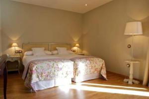 Postel nebo postele na pokoji v ubytování Hotel Villa Monter