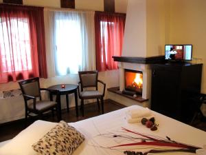 Postel nebo postele na pokoji v ubytování Hotel Mirovoli