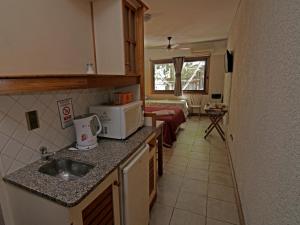 A cozinha ou cozinha compacta de Hotel Xumec Mendoza