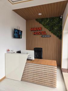 an office with a sign that reads miron hospital at Miran Hostel 2 Vokzal in Andizhan
