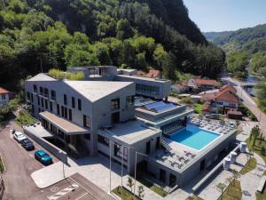 an aerial view of a house with a swimming pool at Terme BANJA LUKA in Banja Luka