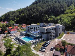 an aerial view of a building with a parking lot at Terme BANJA LUKA in Banja Luka
