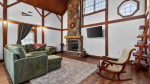 a living room with a couch and a fireplace at Victory View in Gettysburg +21 photos