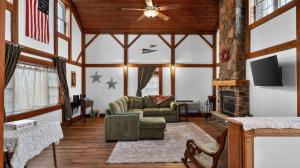 a living room with a couch and a fireplace at Victory View in Gettysburg